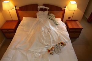 The Brides Dress, Shoes, Flowers and Jewellery 